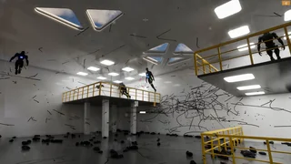Drones hovering around the arena's raised platforms