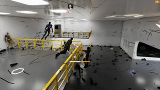 Several drones fighting around the yellow railings
